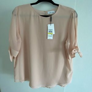 Calvin Klein women peach top